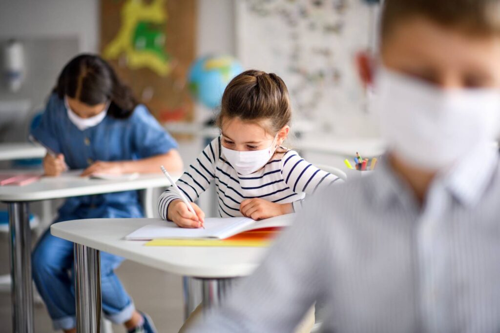 The Risks and Benefits of  In-Person School During a Pandemic